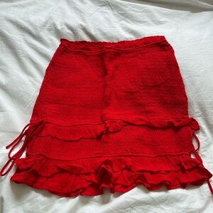 Smocked red mini skirt
